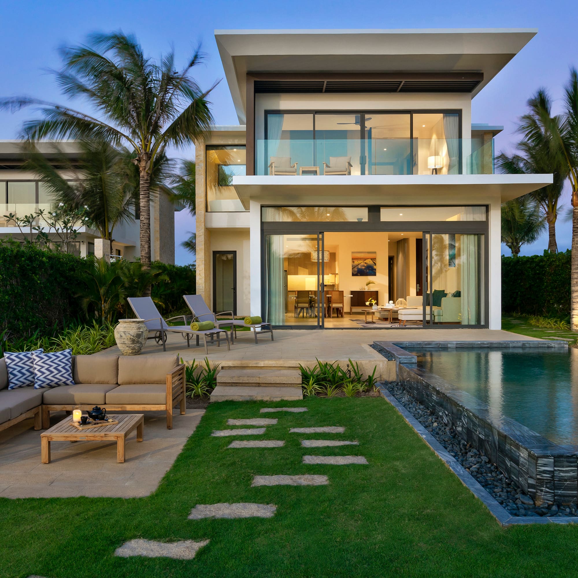 a house with a pool and a couch