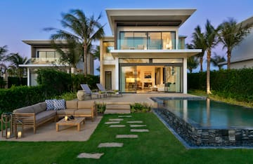 a house with a pool and a couch