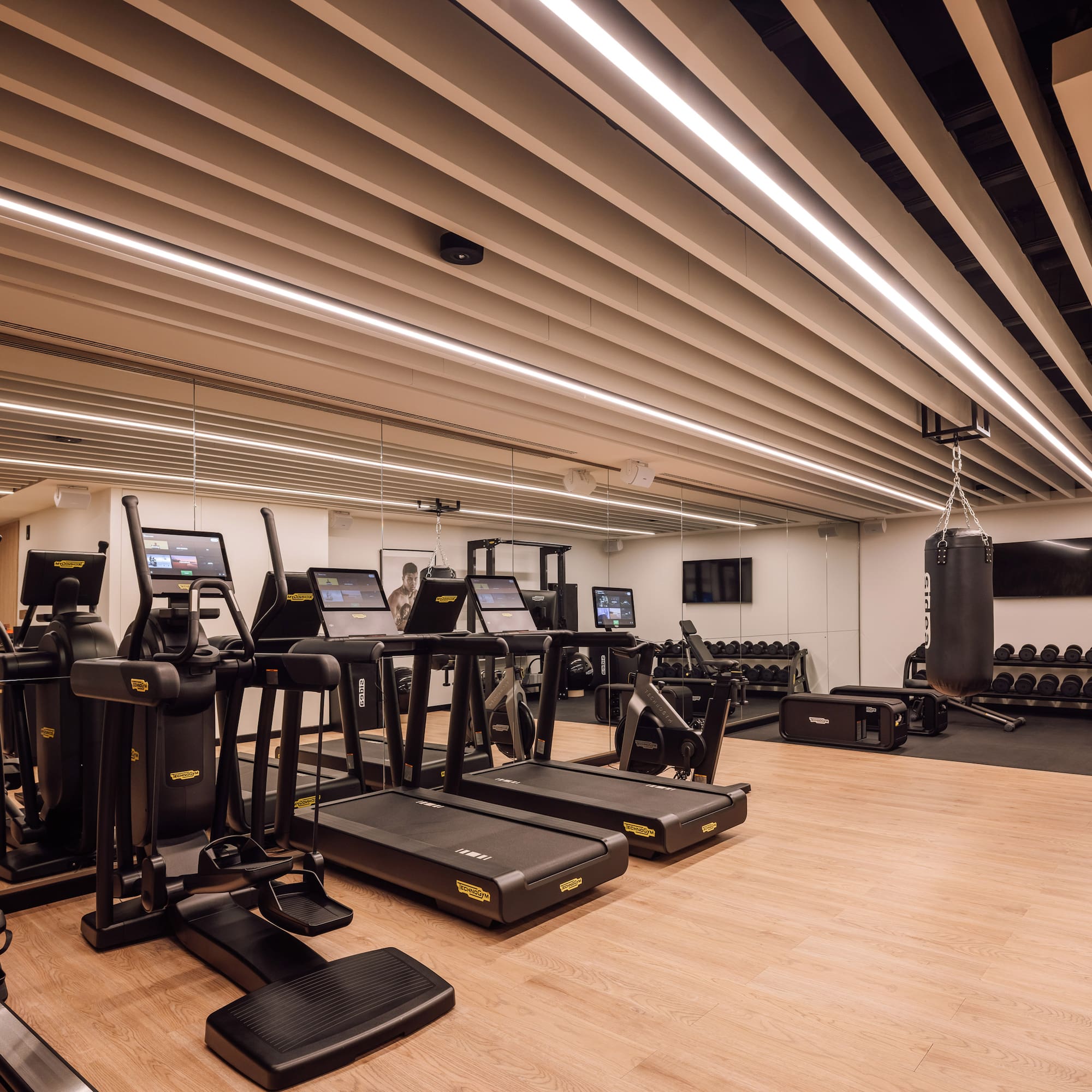 a gym with treadmills and exercise equipment