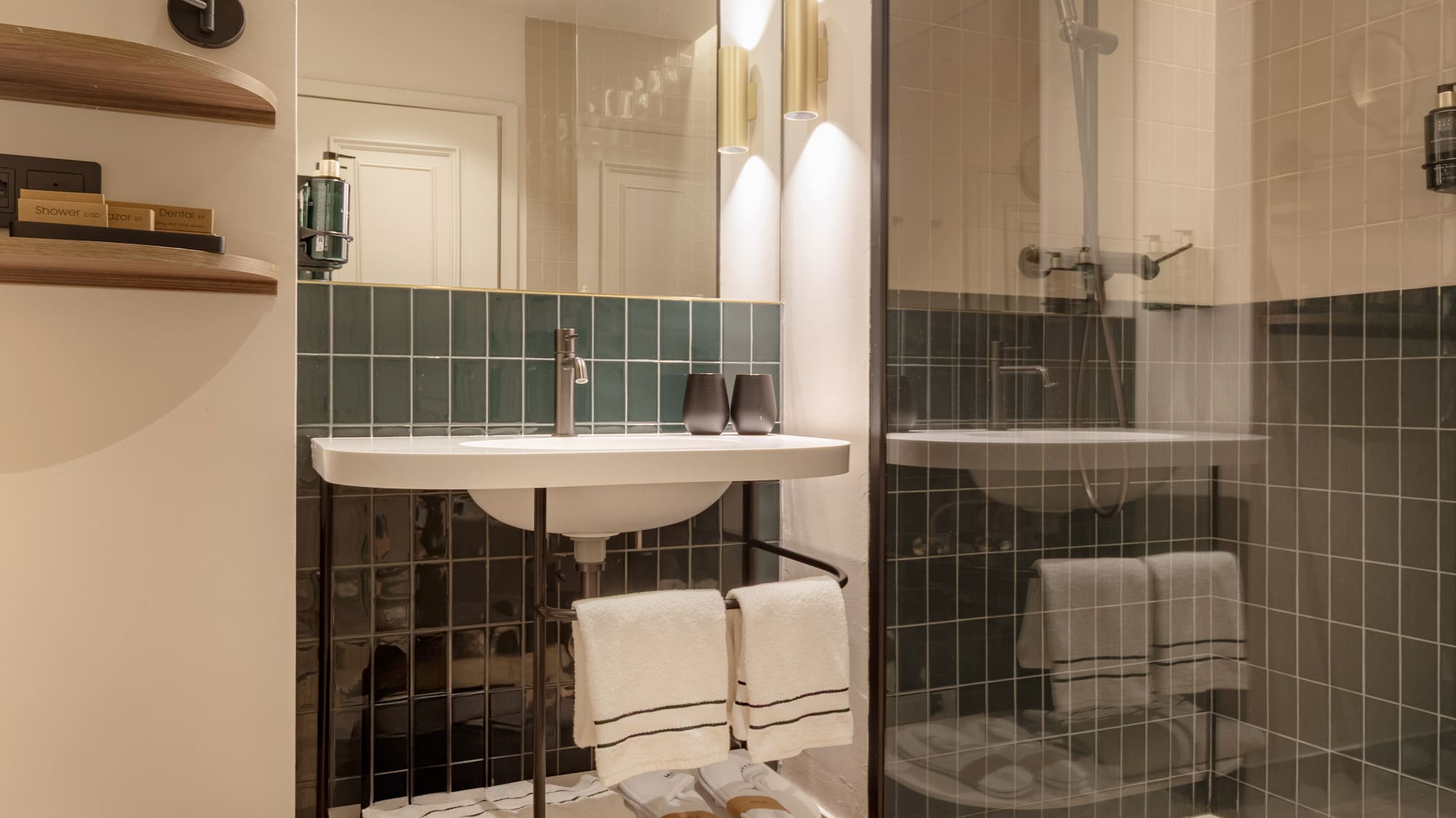 a bathroom with a shower and sink