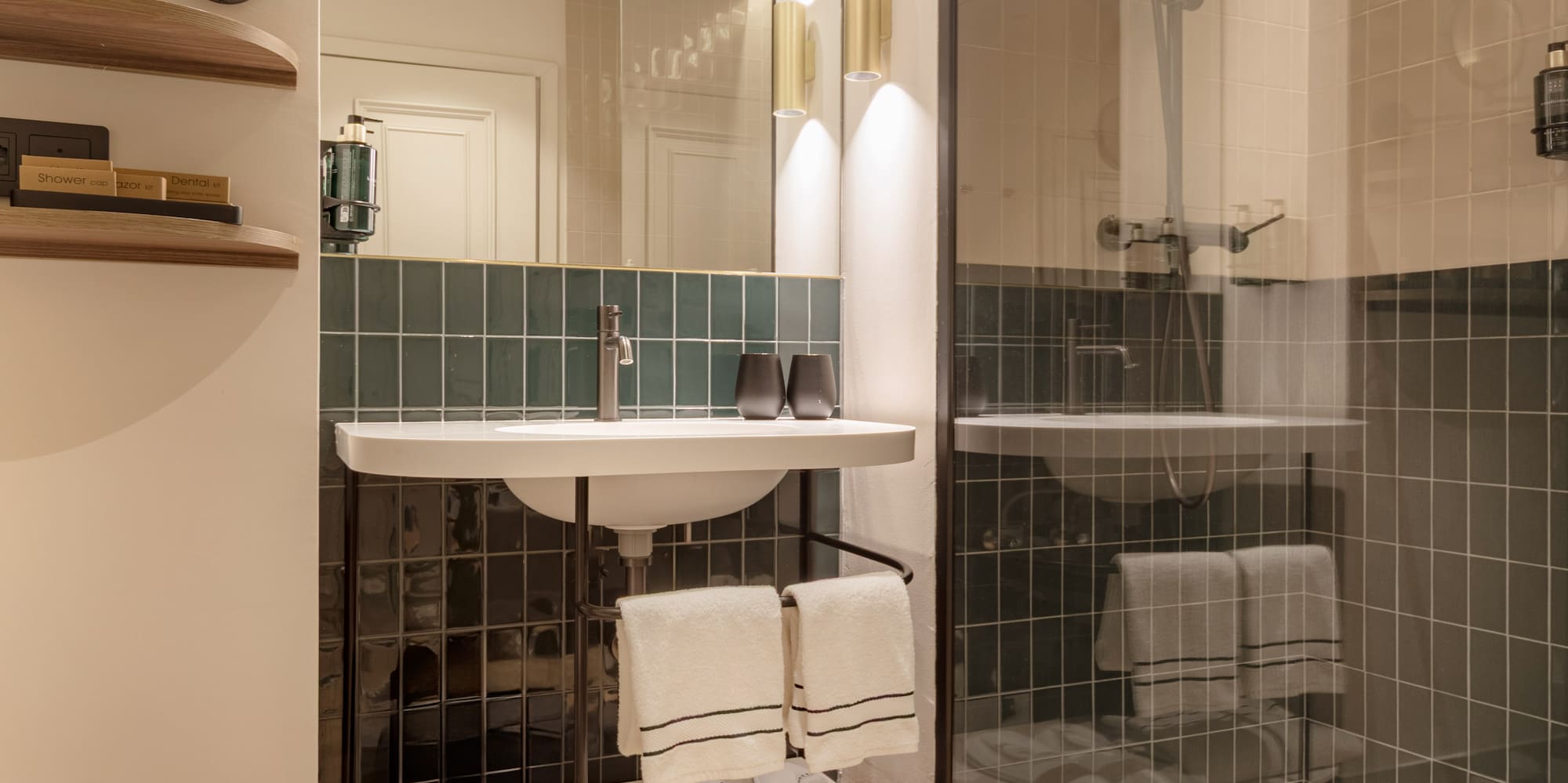 a bathroom with a shower and sink