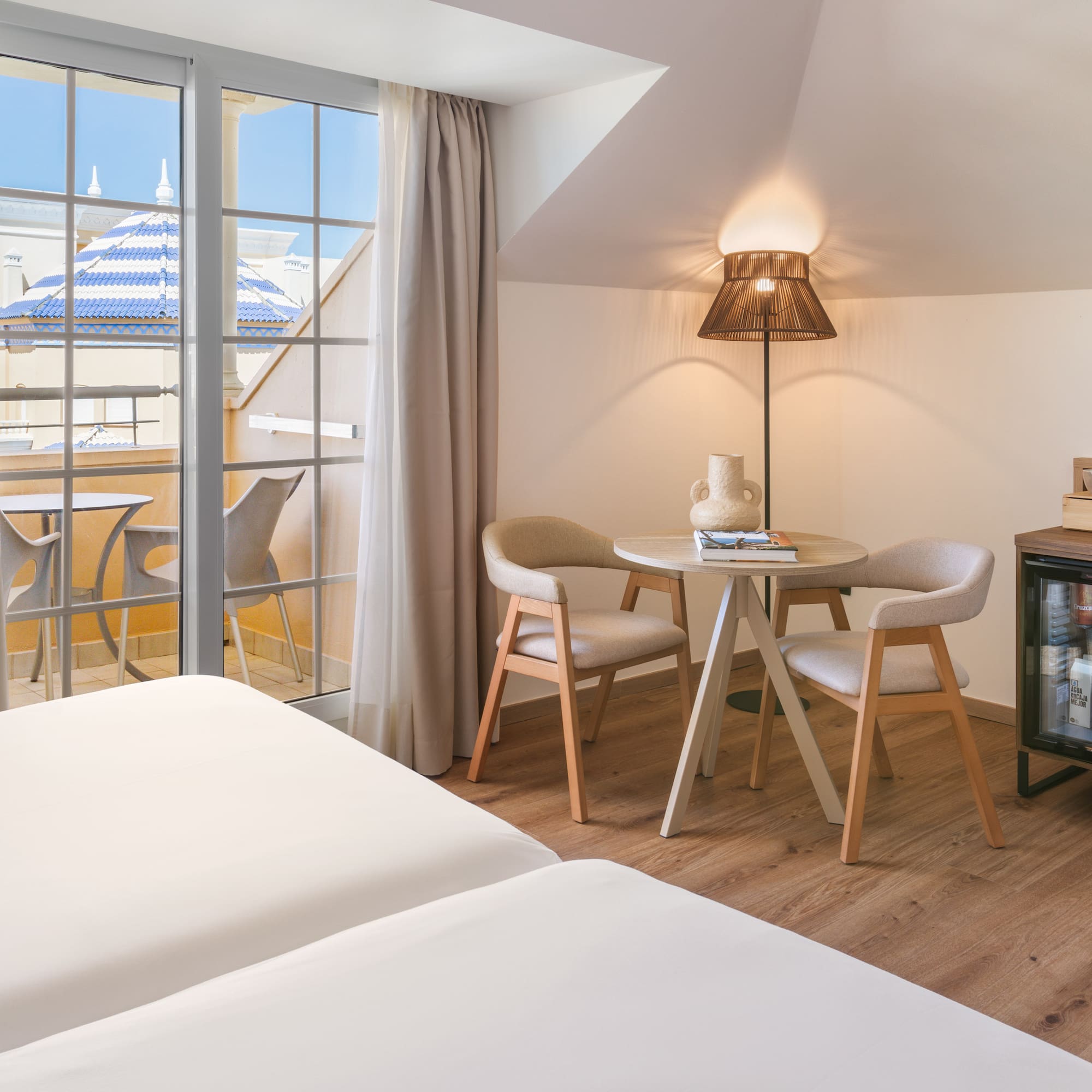 a room with a table and chairs