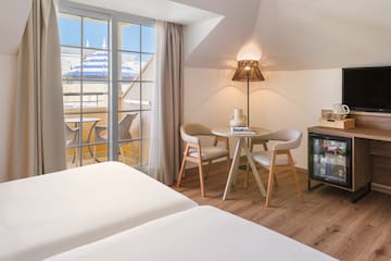 a room with a table and chairs