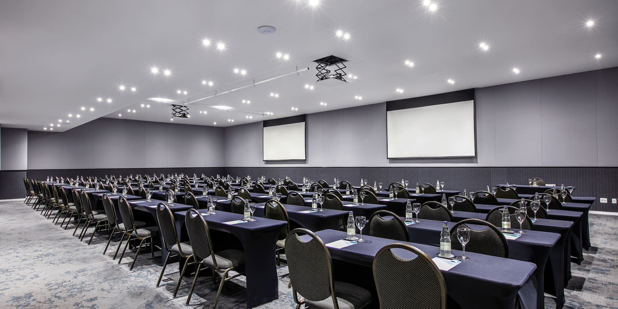 a room with tables and chairs
