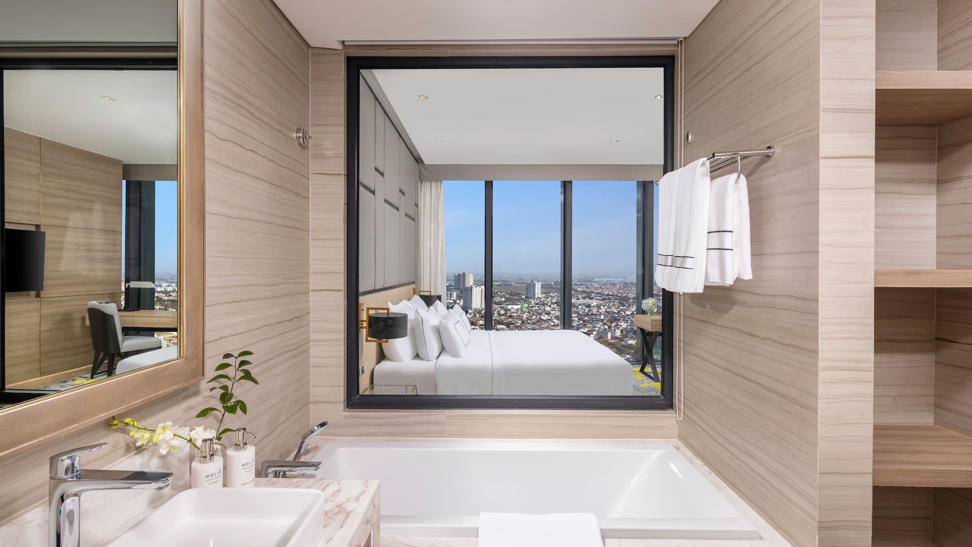 a bathroom with a large window and a bathtub