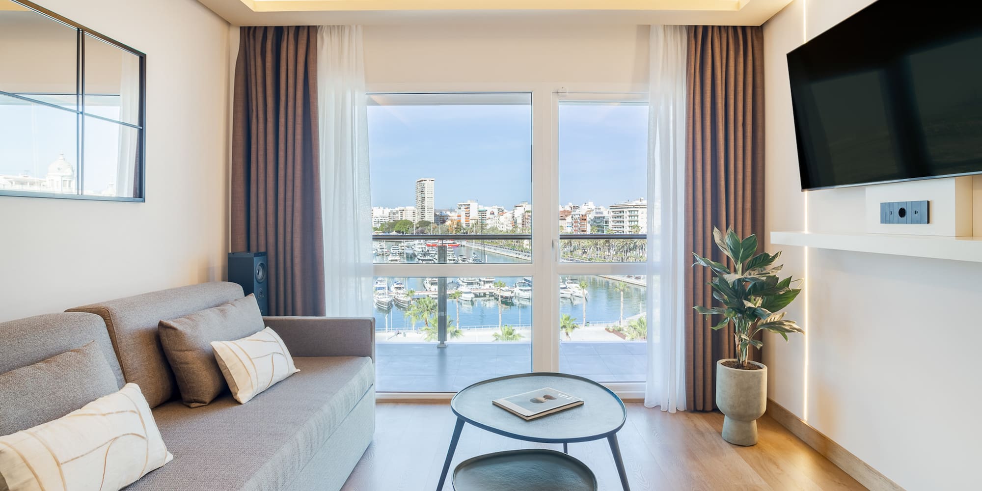 a living room with a couch and a television