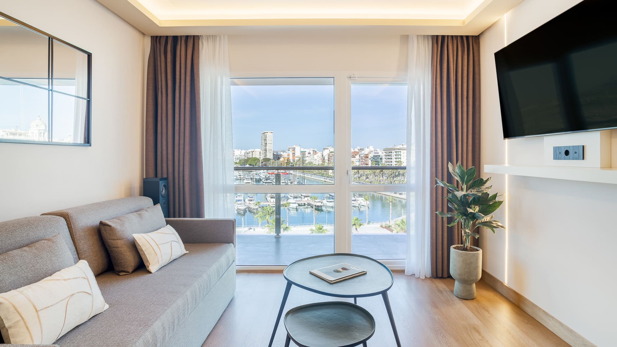 a living room with a couch and a television