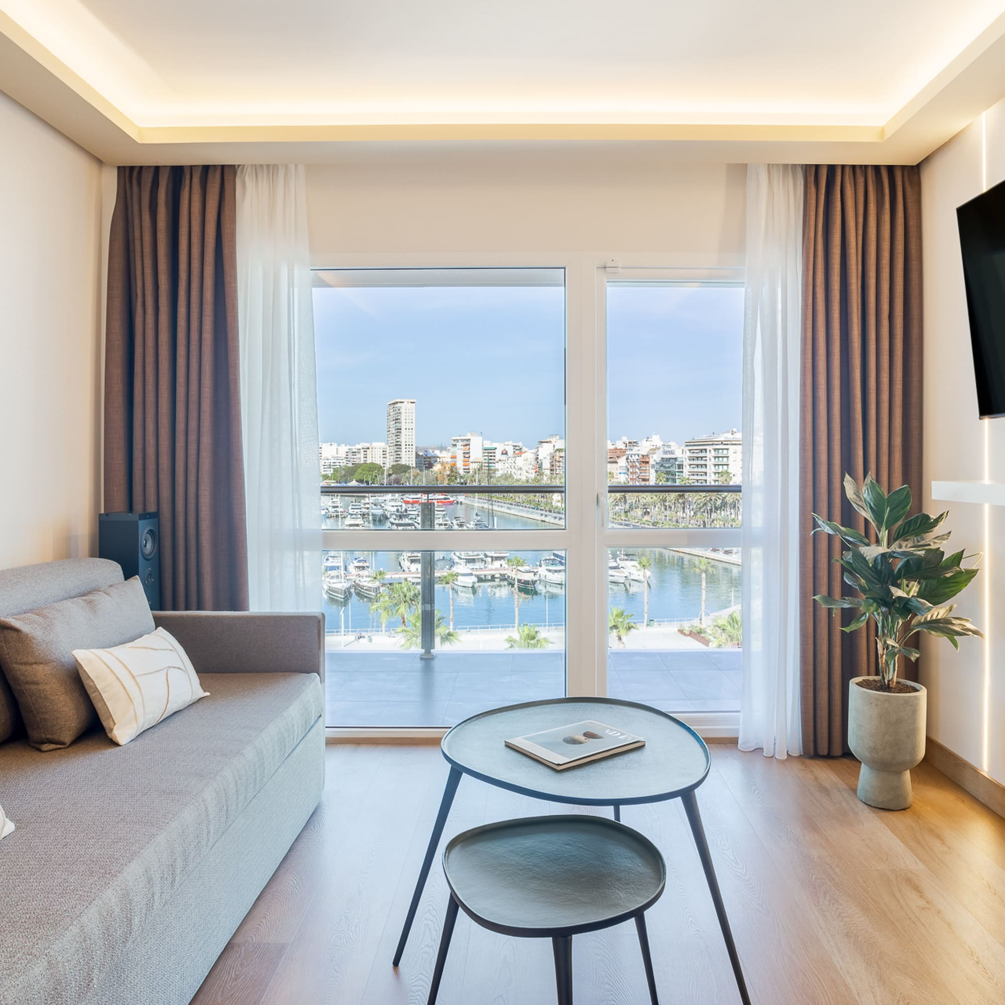 a living room with a couch and a television