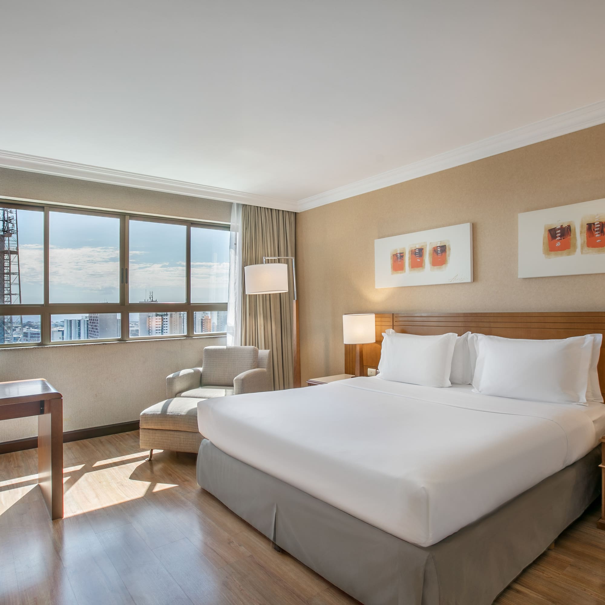 a room with a bed and a chair