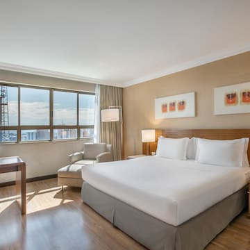 a room with a bed and a chair