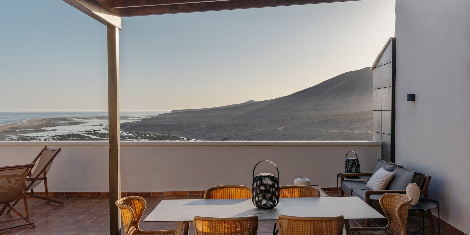a patio with a table and chairs