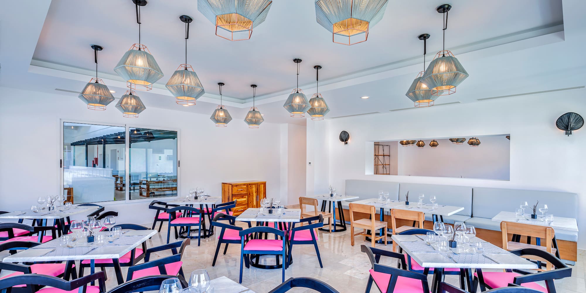 a room with tables and chairs