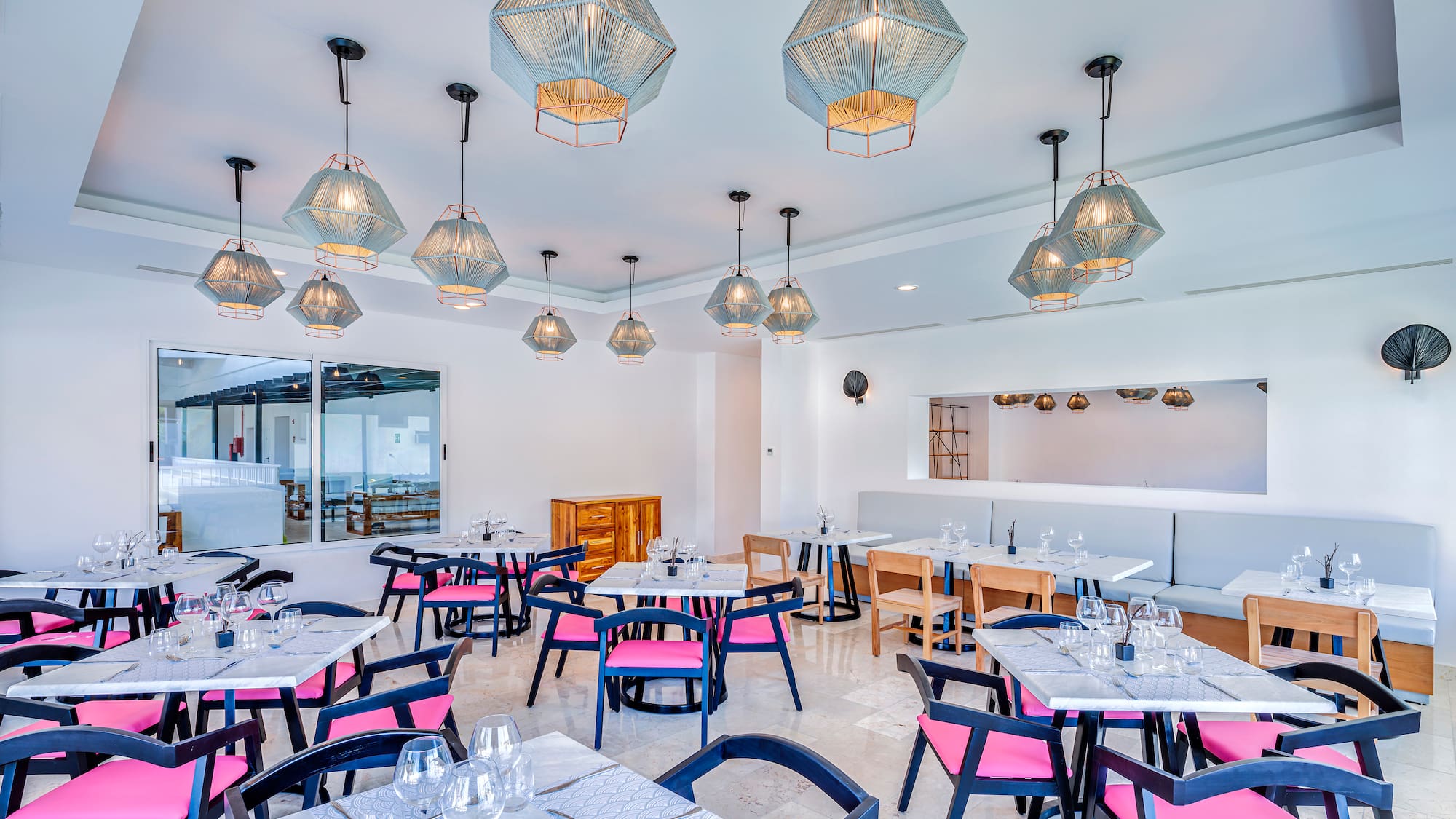 a room with tables and chairs