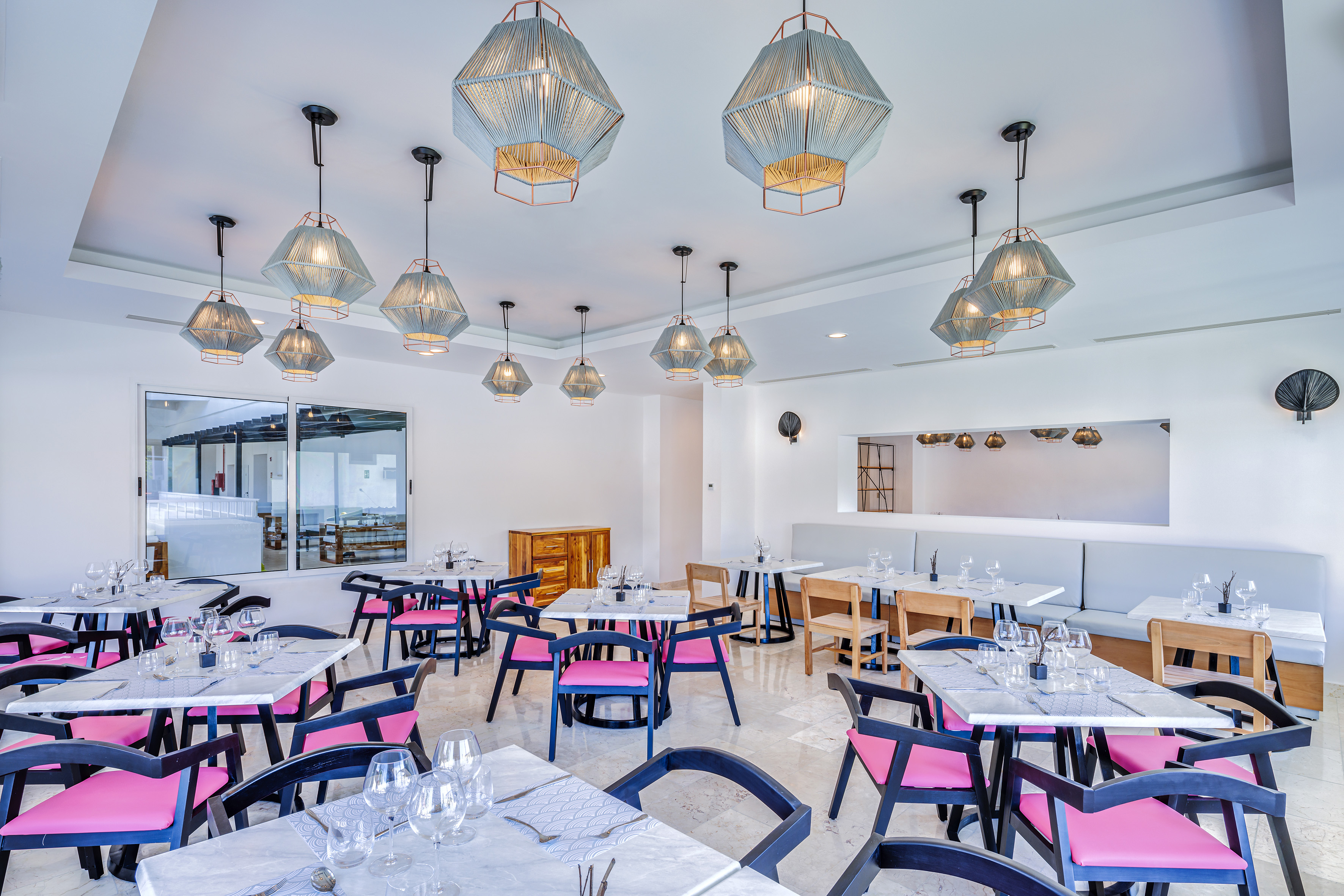 a room with tables and chairs