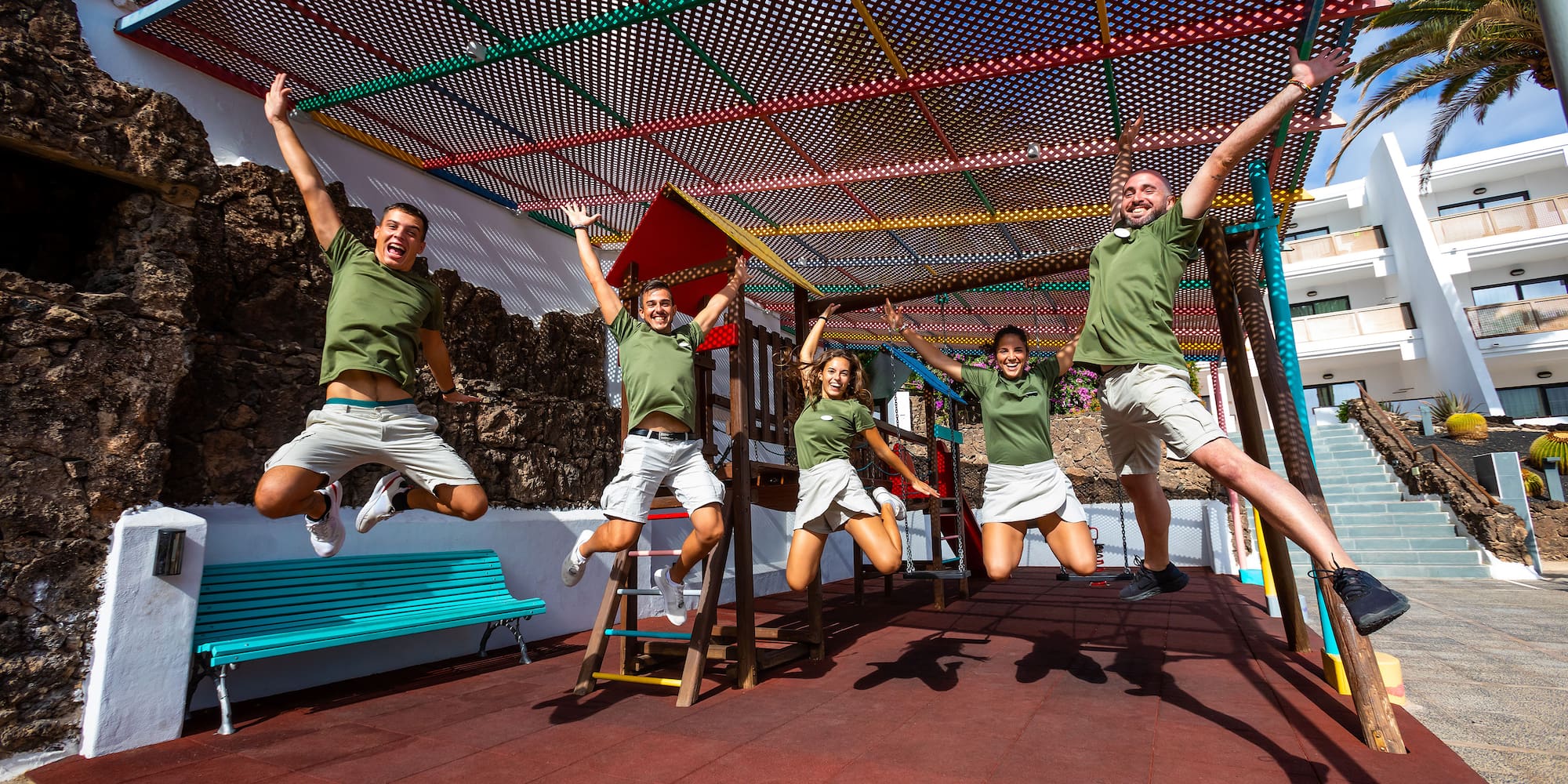 a group of people jumping in the air