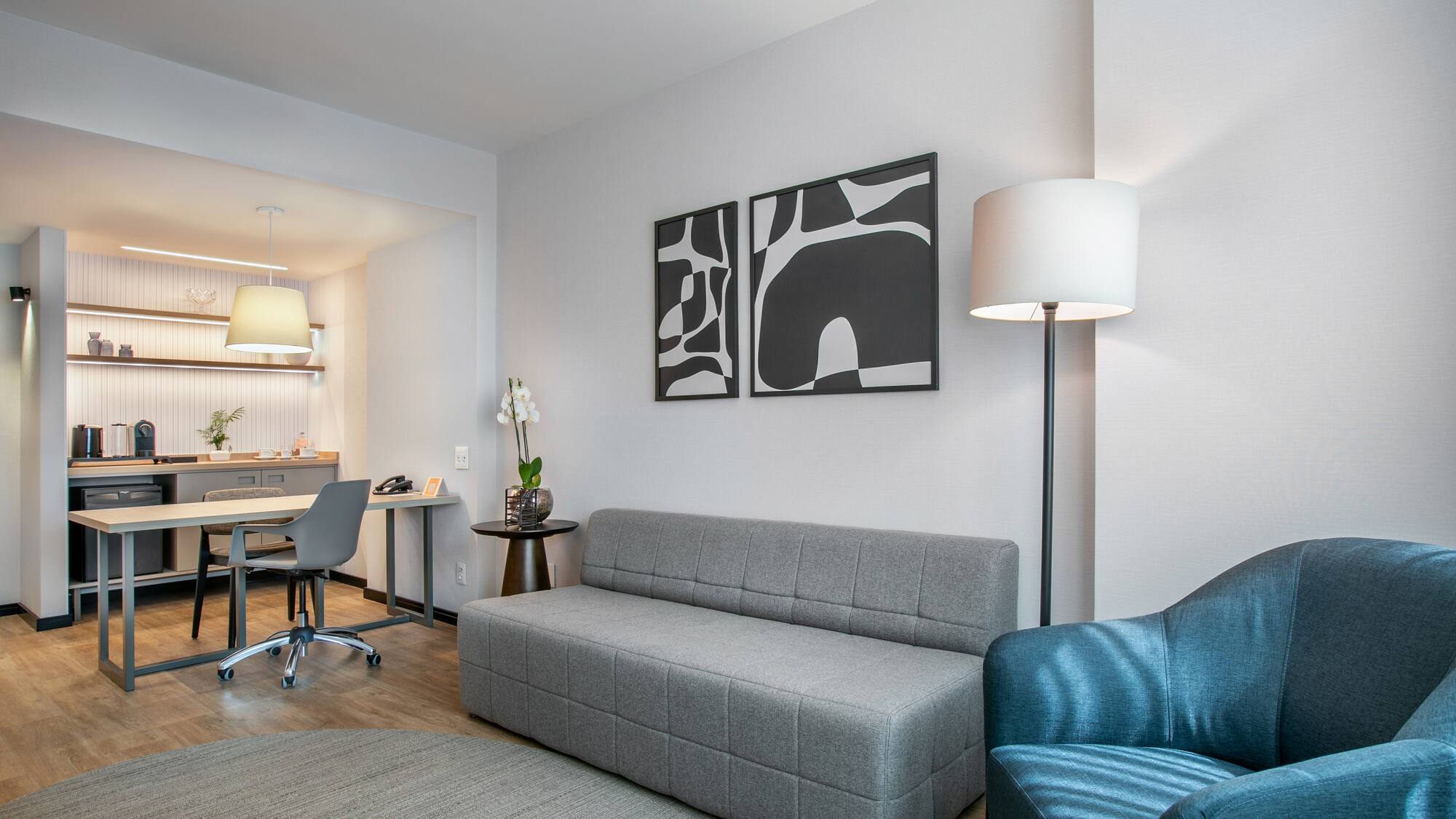 a living room with a couch and a table