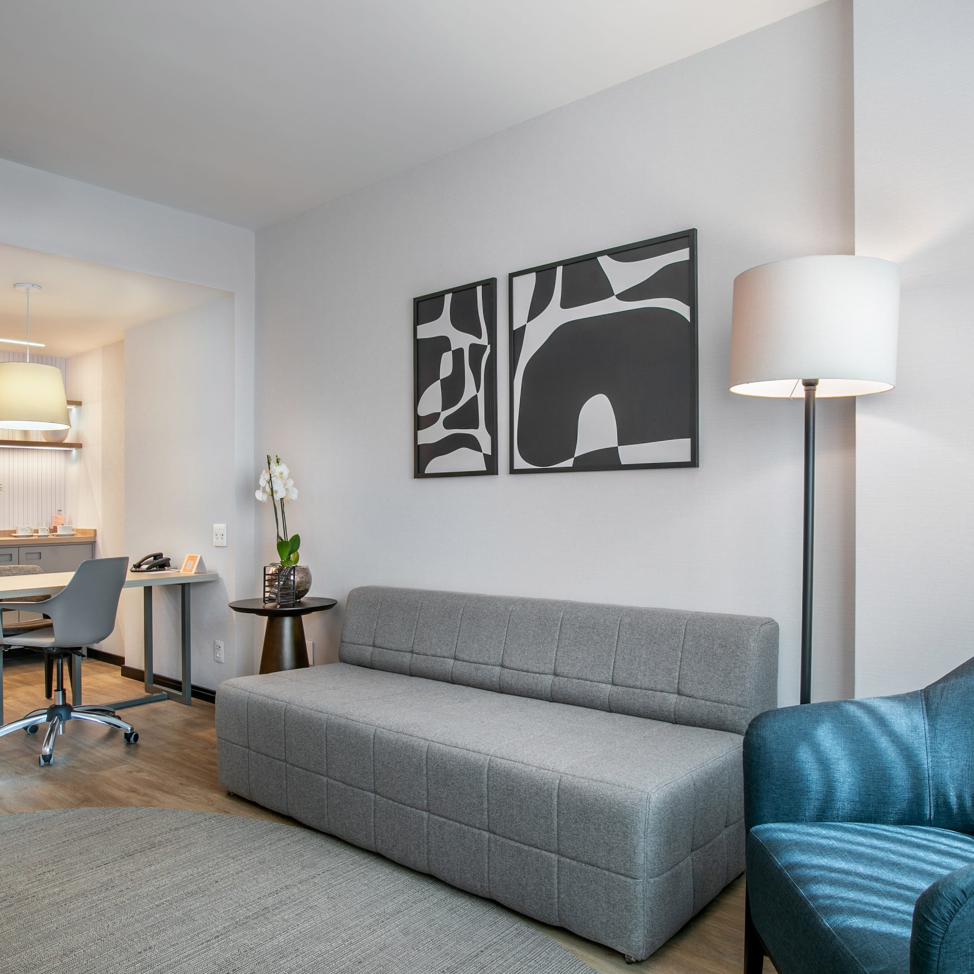 a living room with a couch and a table