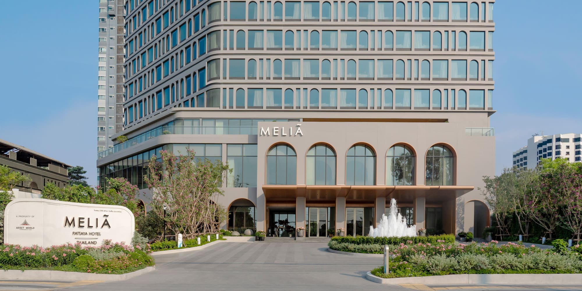 a building with a fountain in front of it