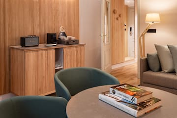 a room with a table and chairs