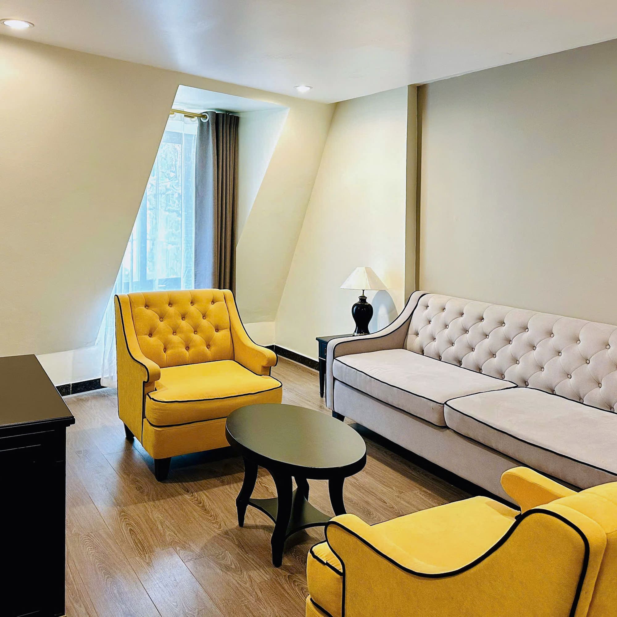 a room with couches and chairs