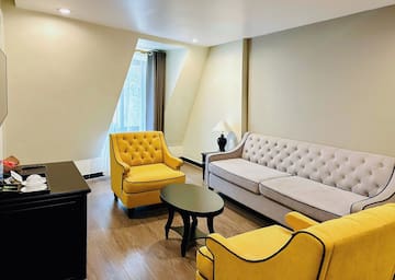 a room with couches and chairs