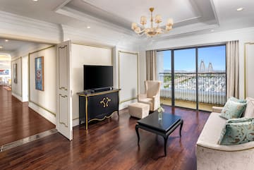 a living room with a television and a table