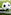 Black and white soccer ball on a green football field, near the white line.
