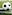 Black and white soccer ball on a green football field, near the white line.