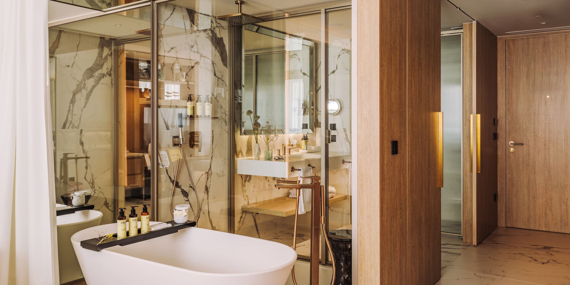 a bathroom with a tub and a sink