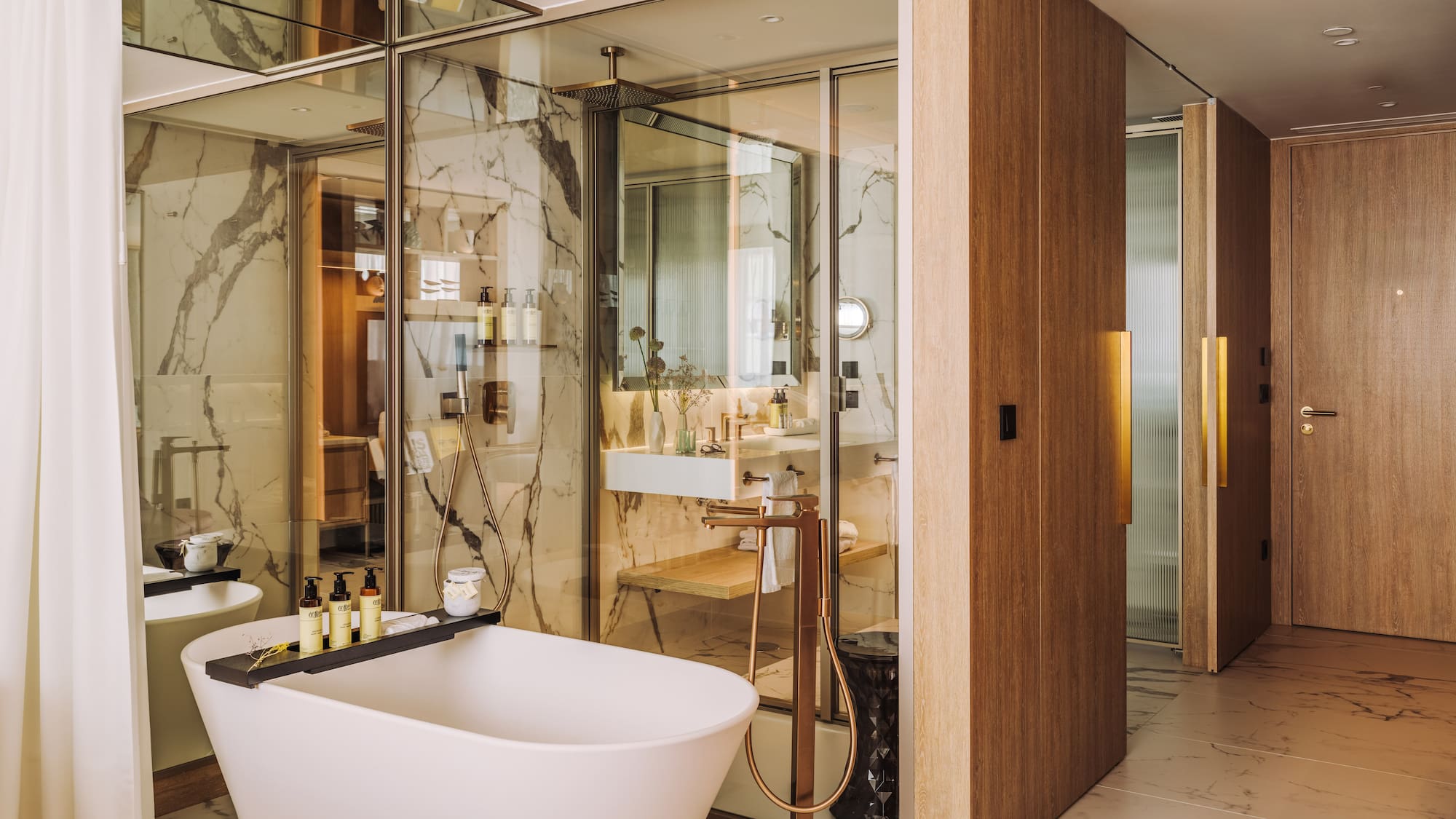 a bathroom with a tub and a sink