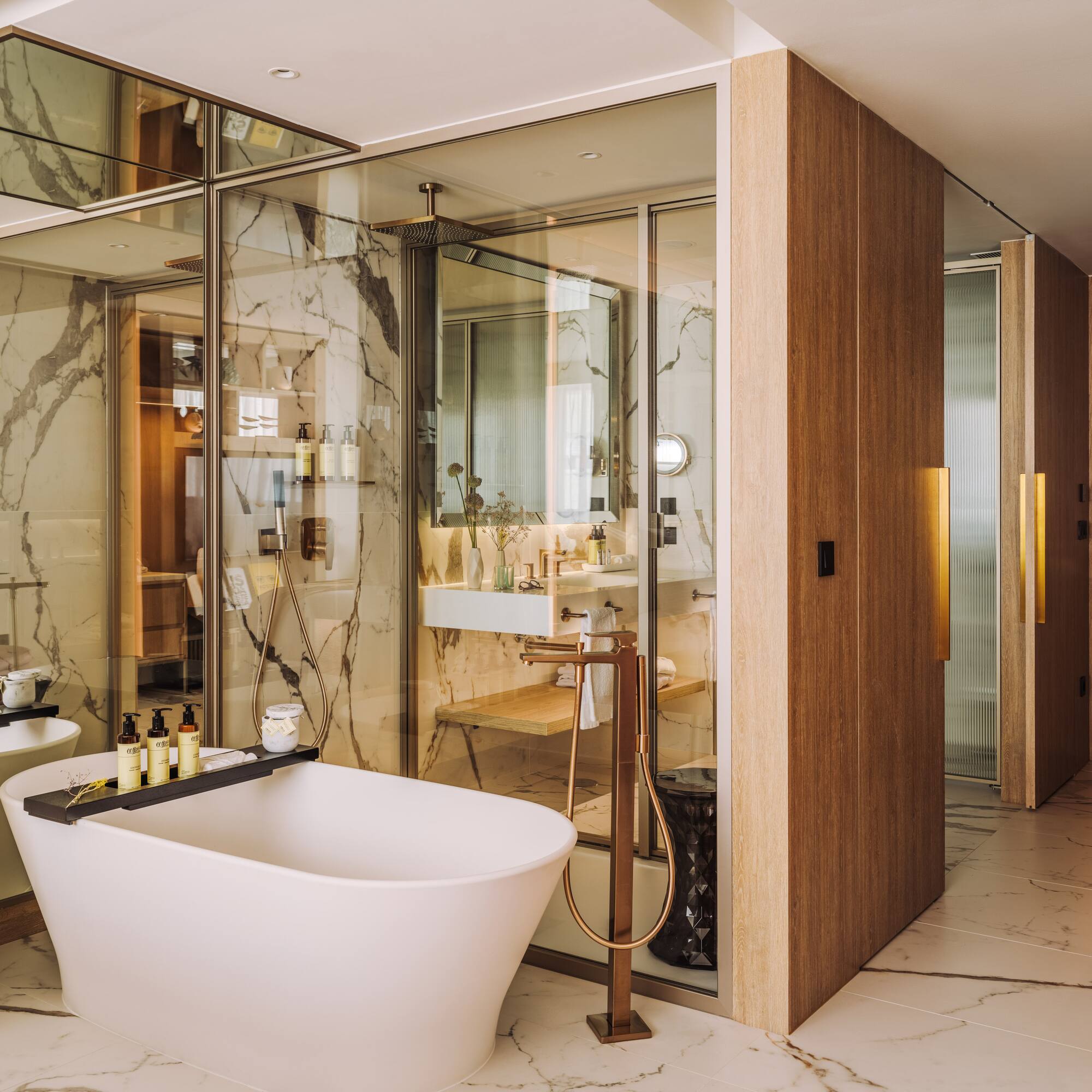 a bathroom with a tub and a sink