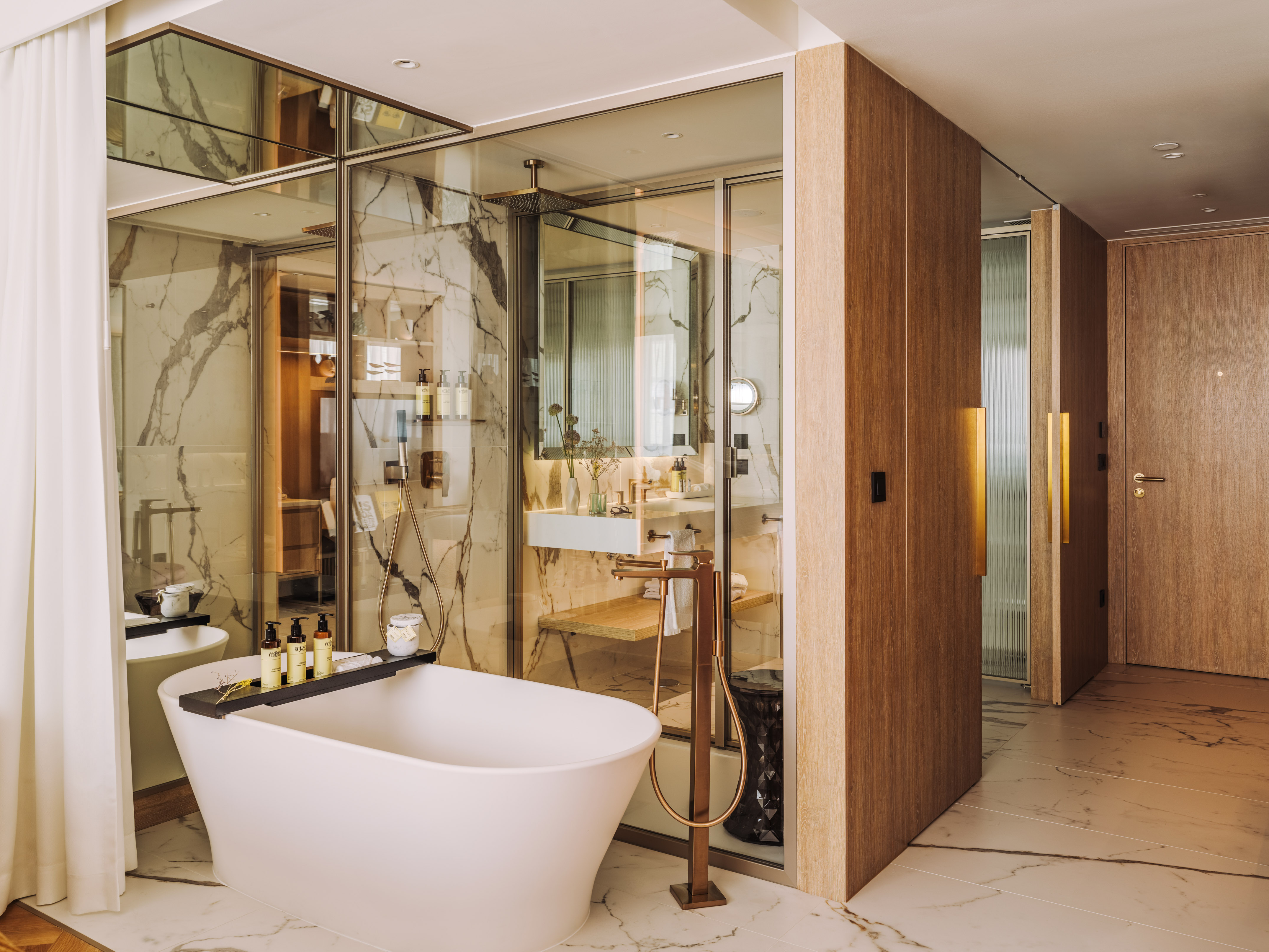 a bathroom with a tub and a sink