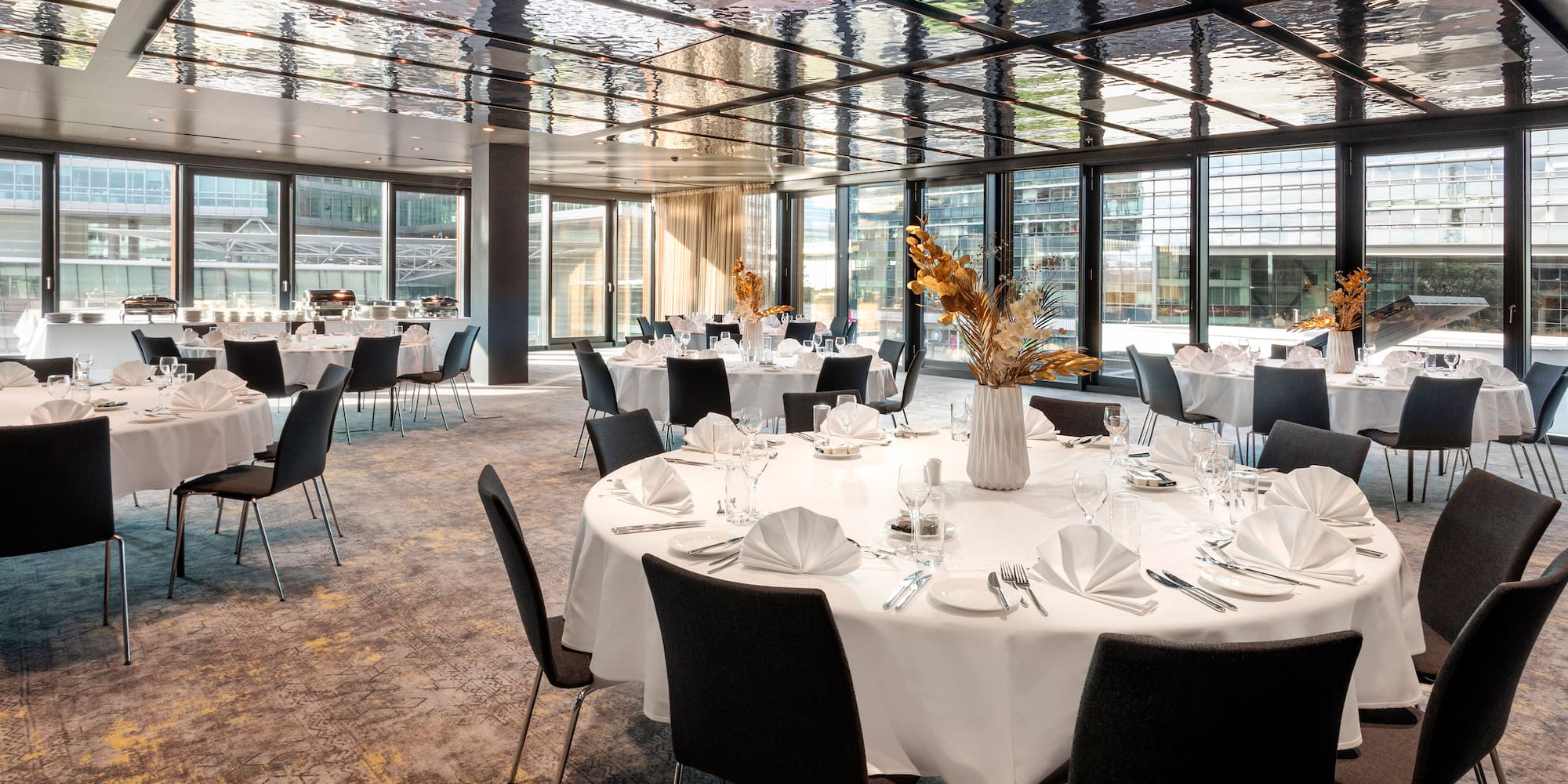 a room with tables and chairs