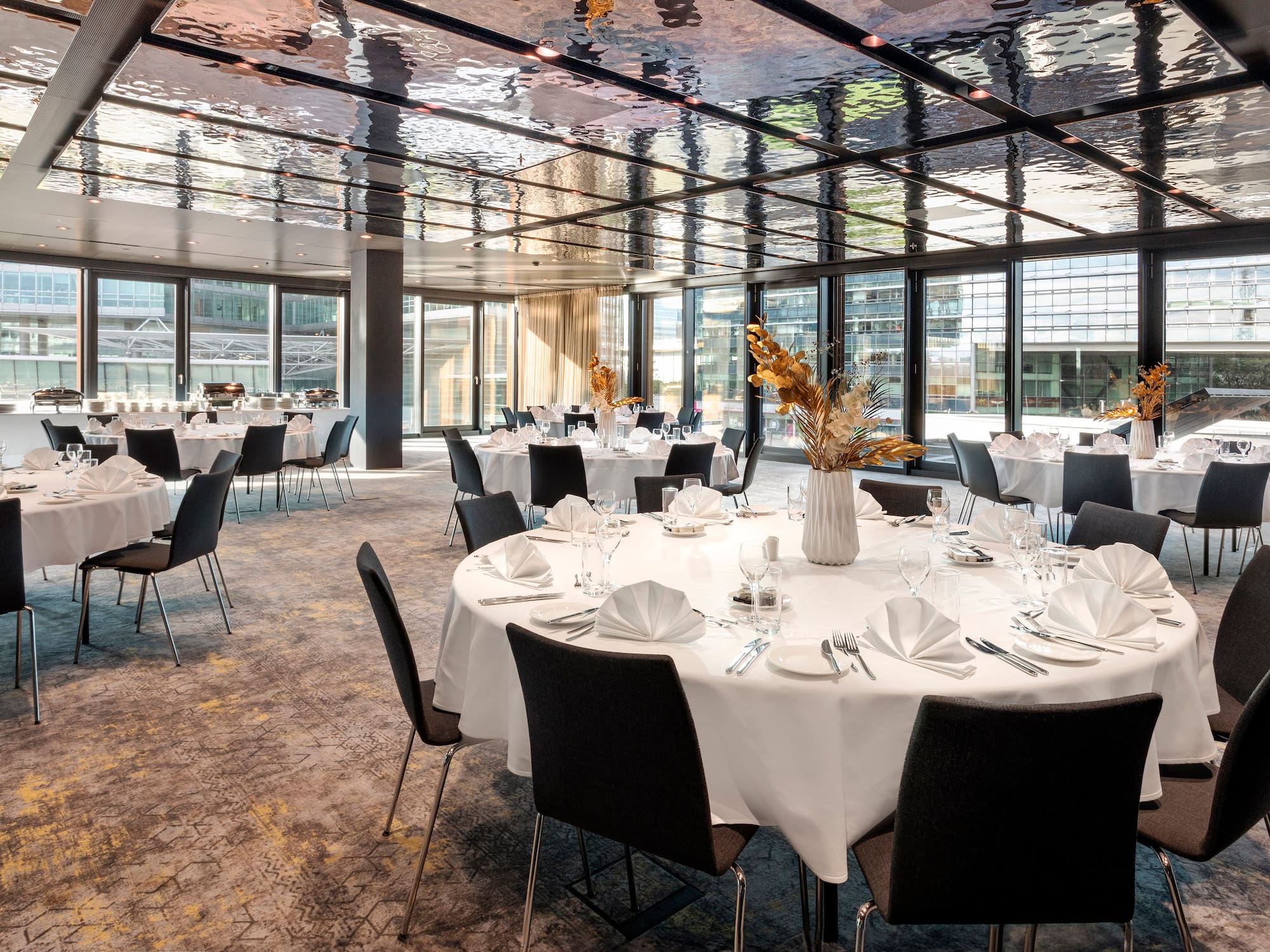 a room with tables and chairs