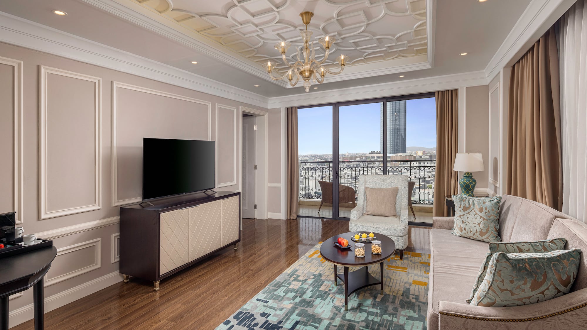 a living room with a tv and couch