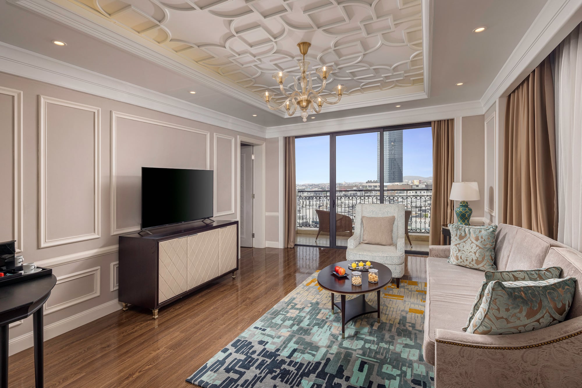 a living room with a tv and couch