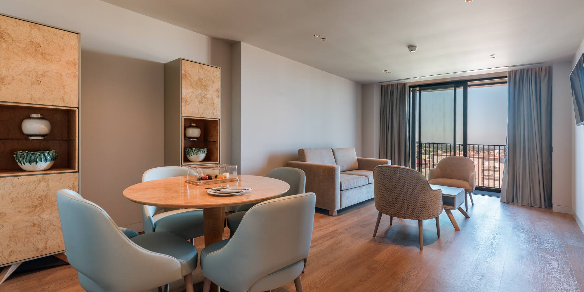 a room with a table and chairs