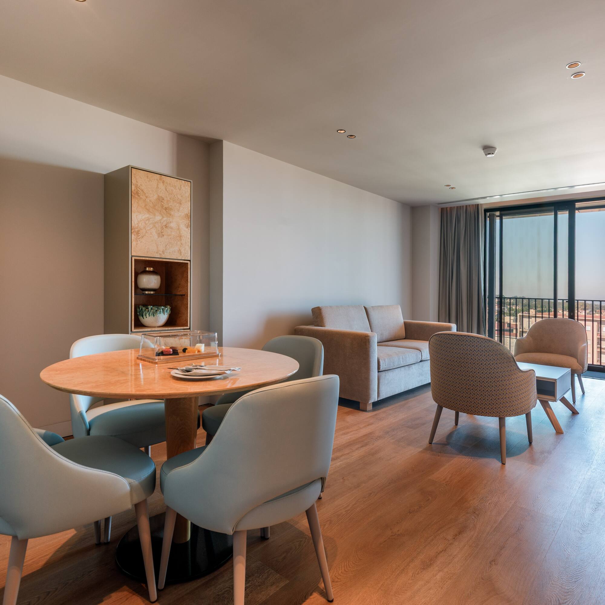 a room with a table and chairs