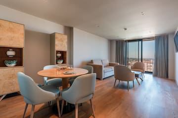 a room with a table and chairs