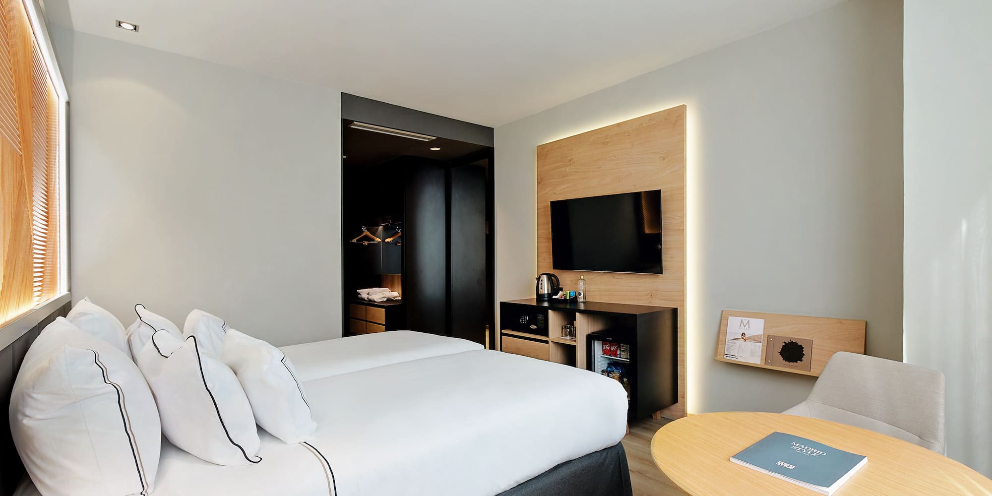 a room with a bed and a table