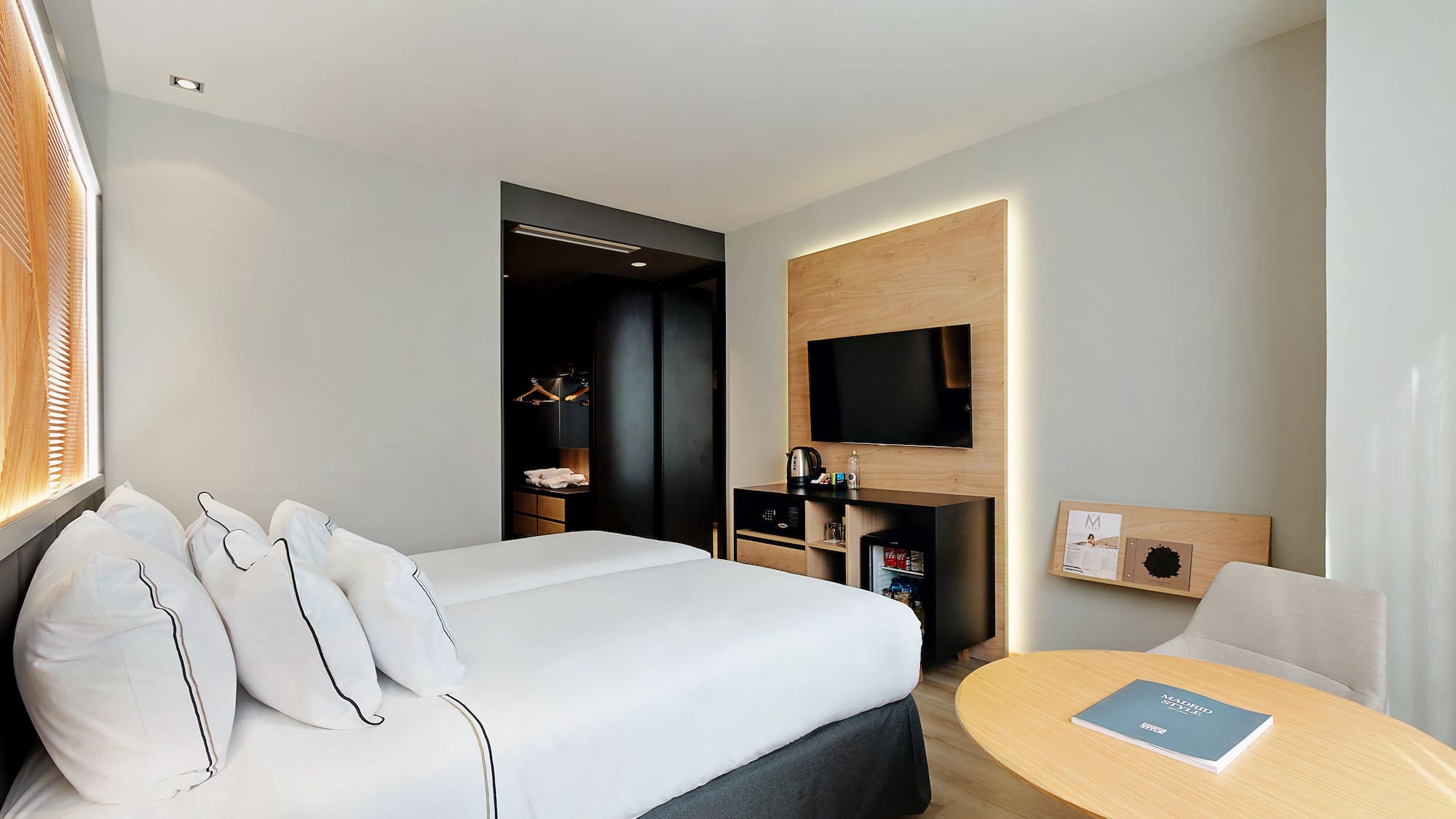 a room with a bed and a table