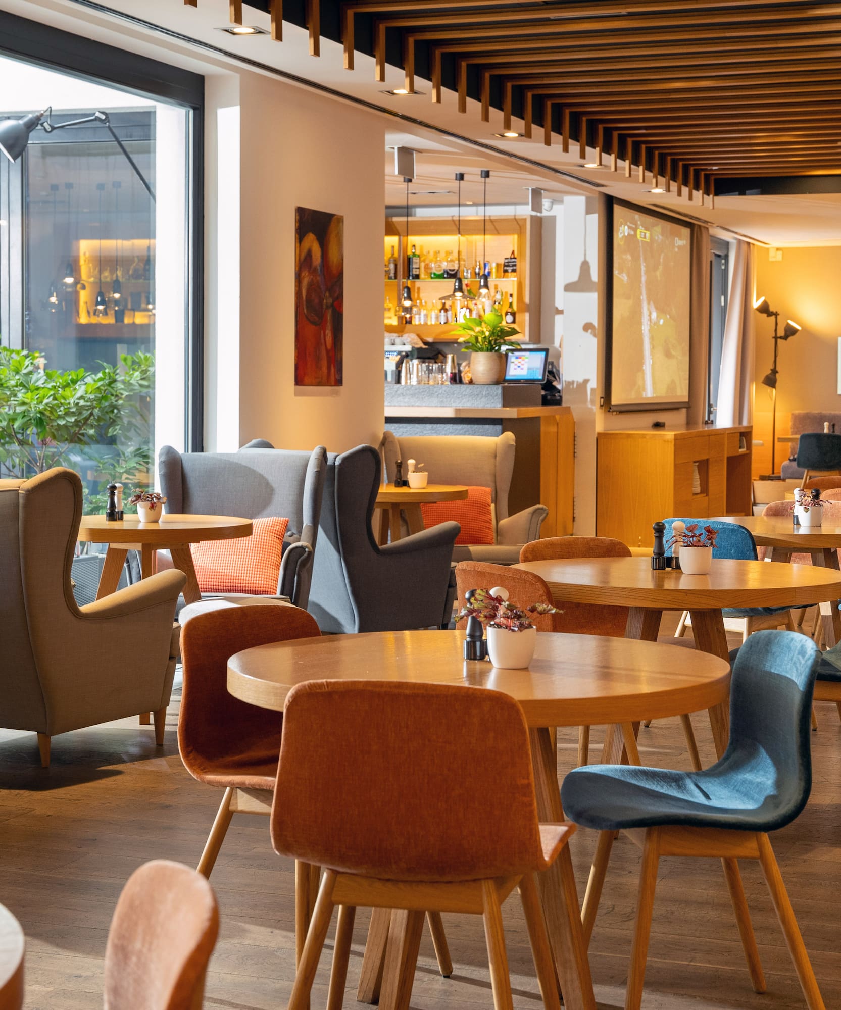 a room with tables and chairs