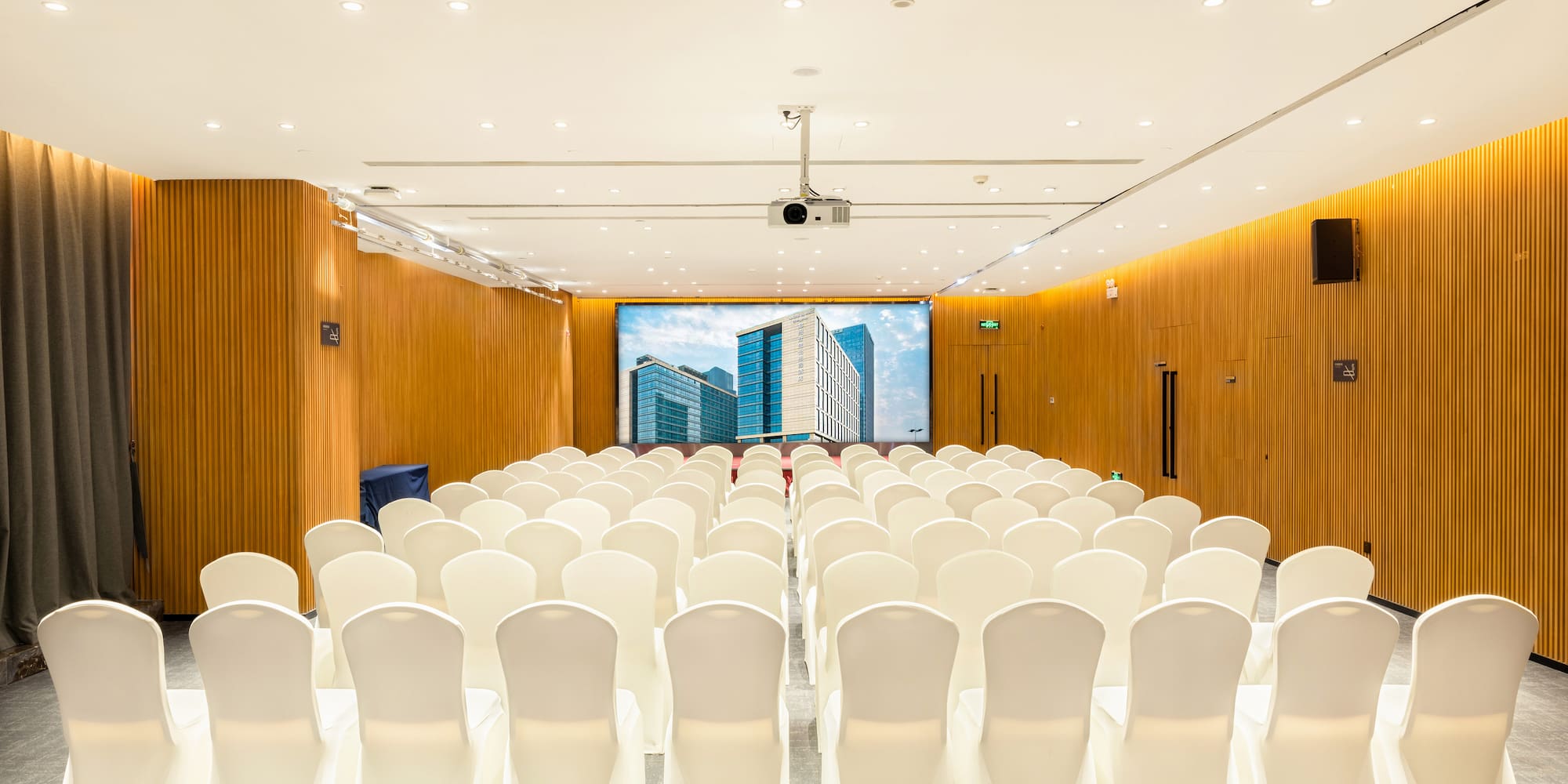 a room with white chairs