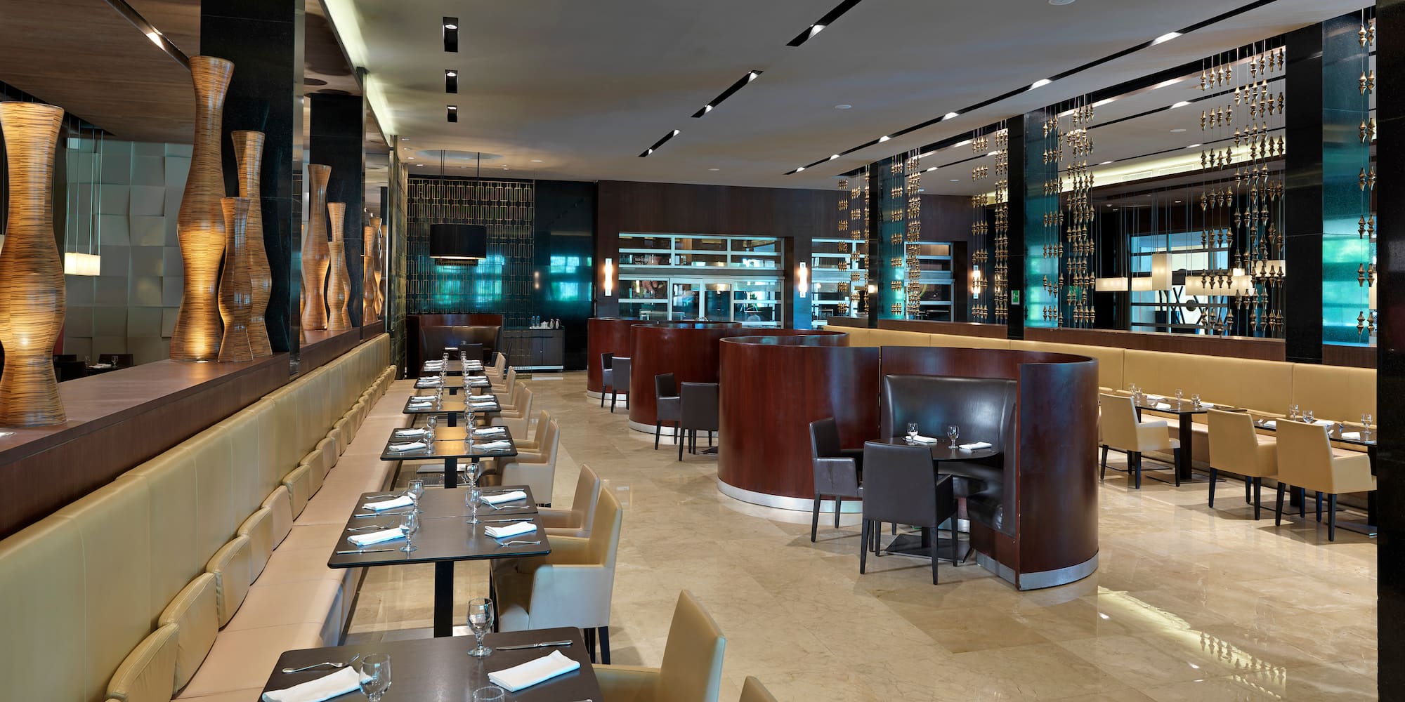 a restaurant with tables and chairs