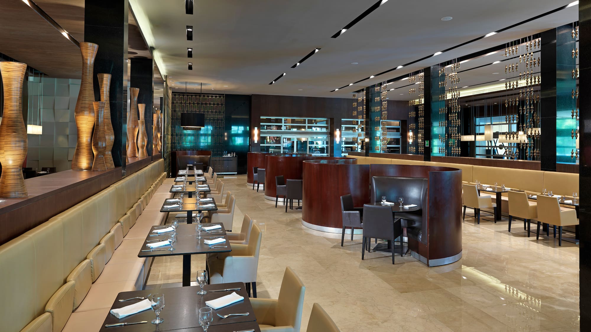 a restaurant with tables and chairs