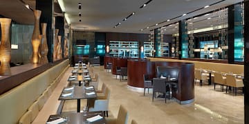 a restaurant with tables and chairs