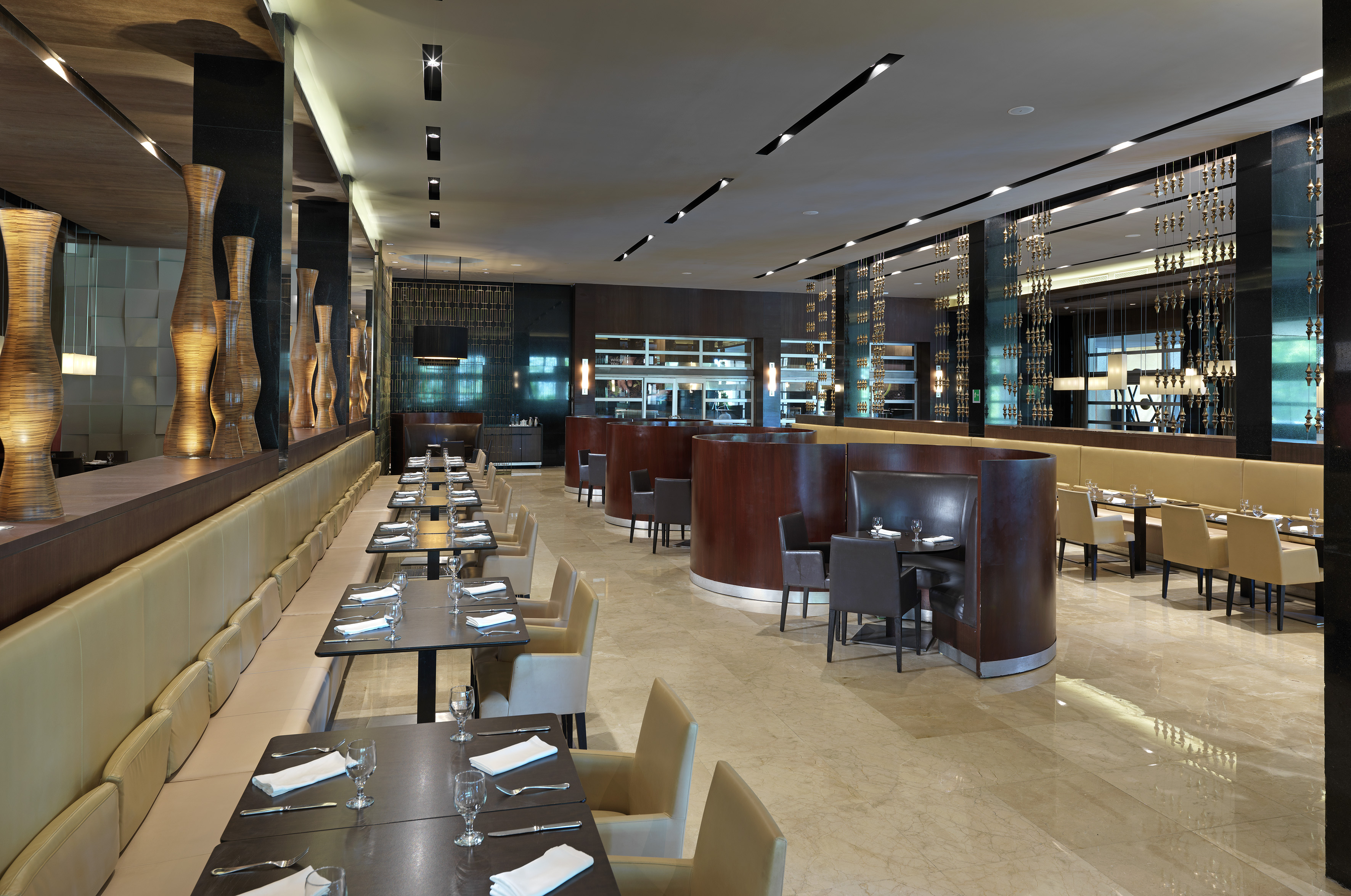 a restaurant with tables and chairs