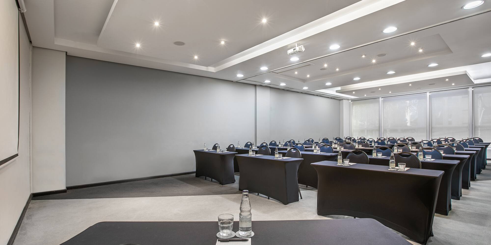 a room with tables and chairs