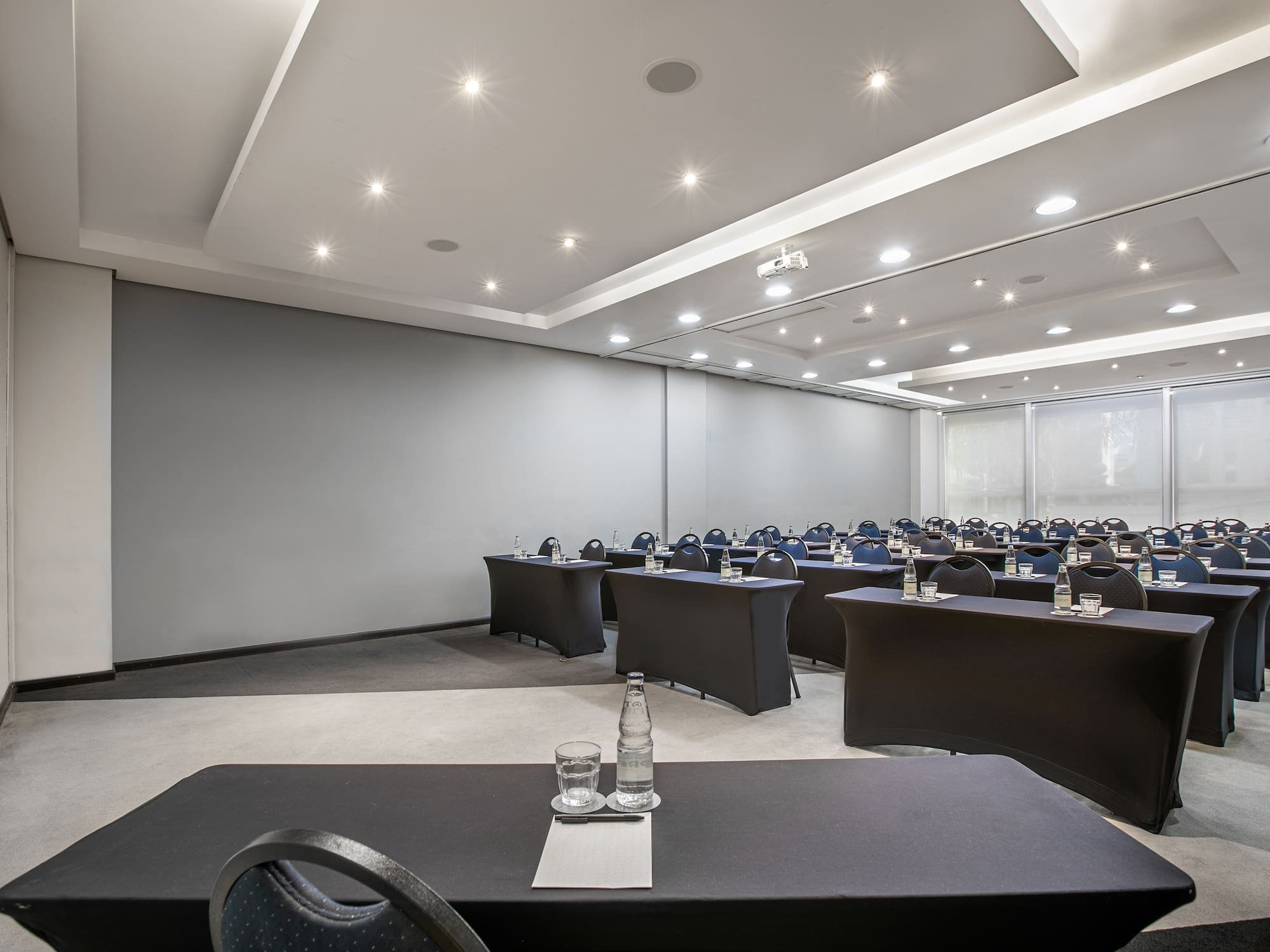 a room with tables and chairs