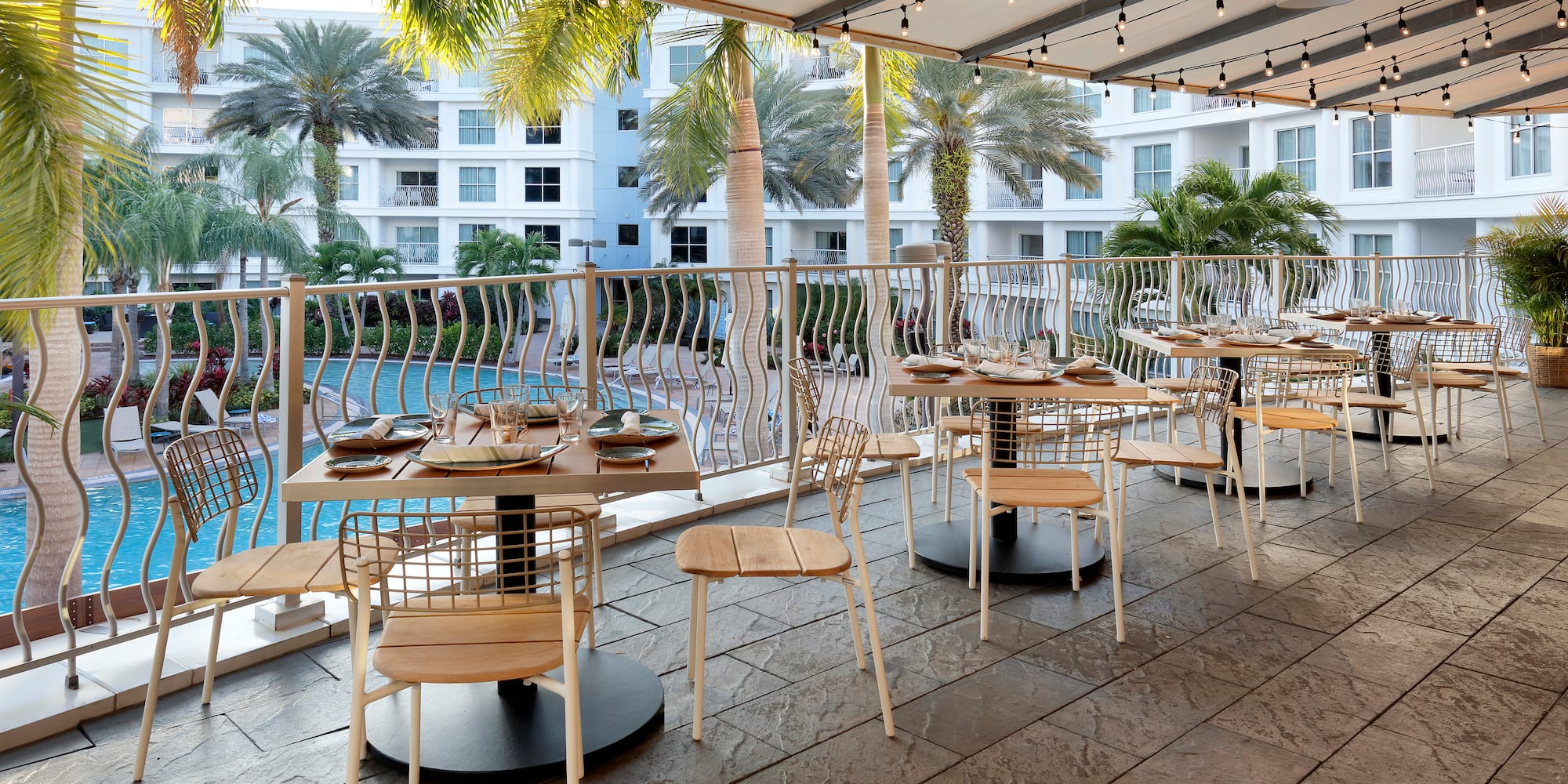 a restaurant with tables and chairs